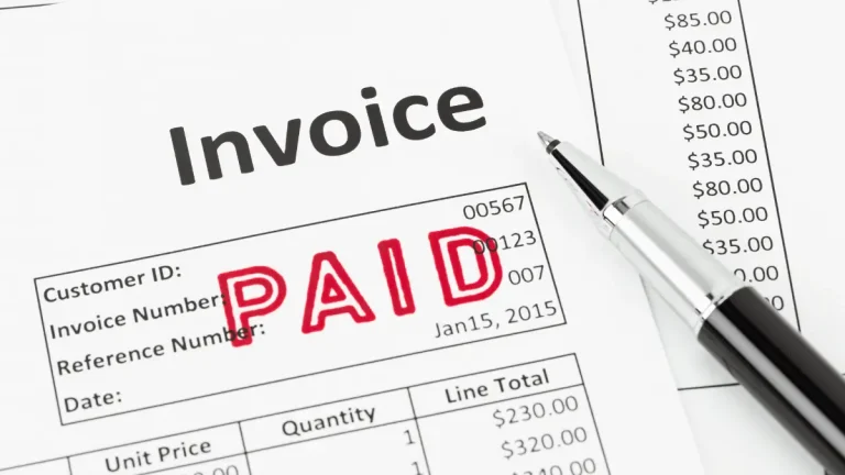 How do I enter an invoice after it has already been paid?